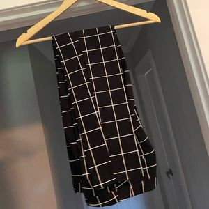 Black and white plaid skinny slacks.